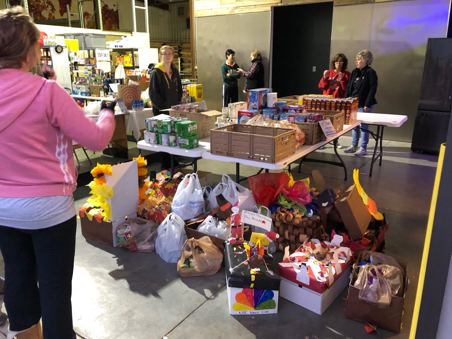 Volunteers assist the Mead Food Bank in our warehouse.